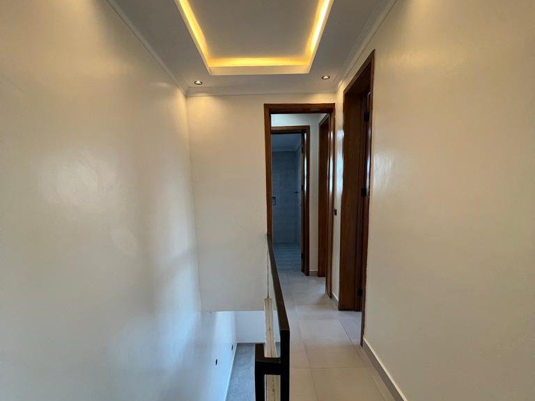 Inicium House, Kigali — upper landing and stair